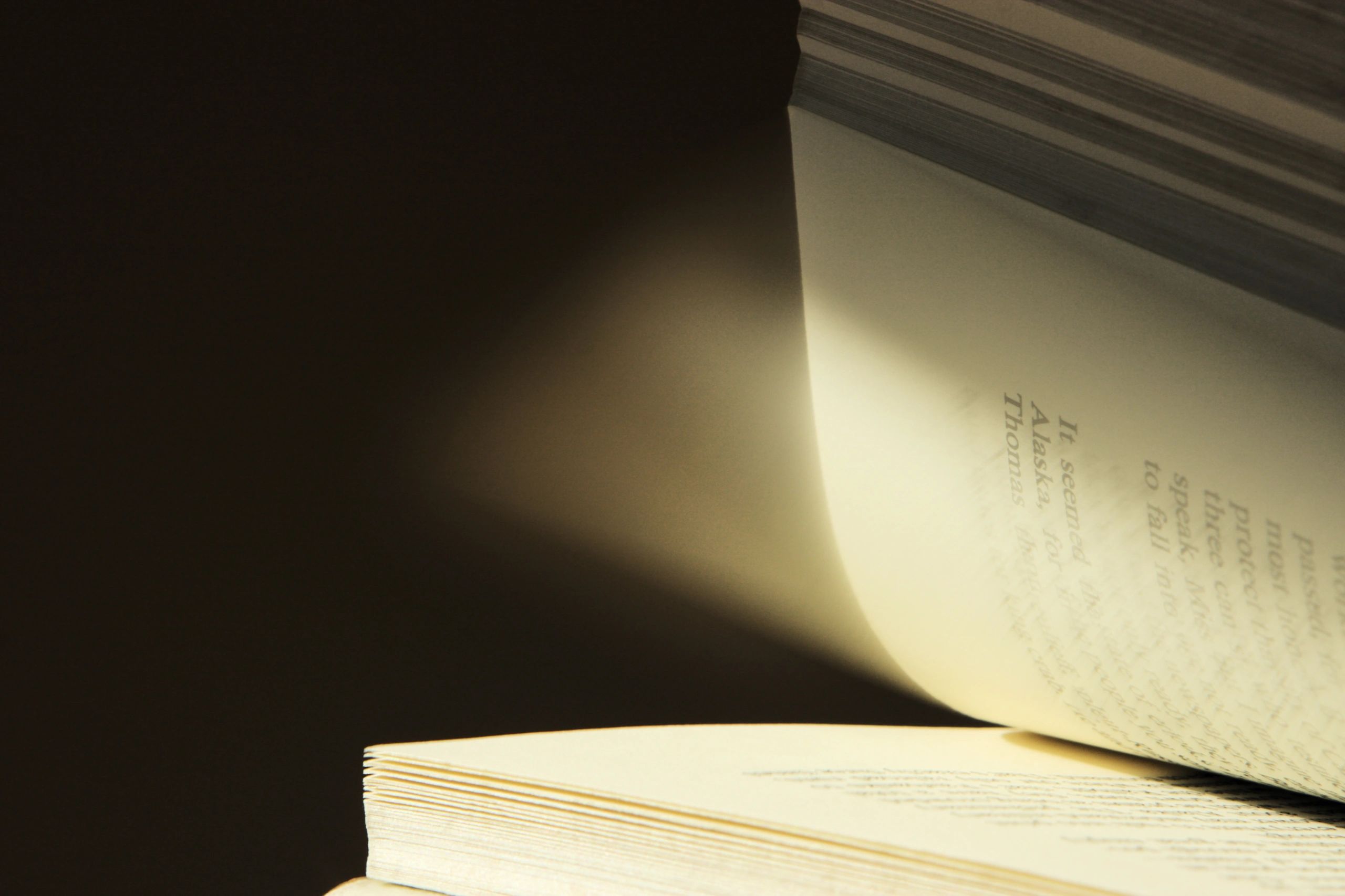 Pages turning in a book, symbolizing a new chapter.