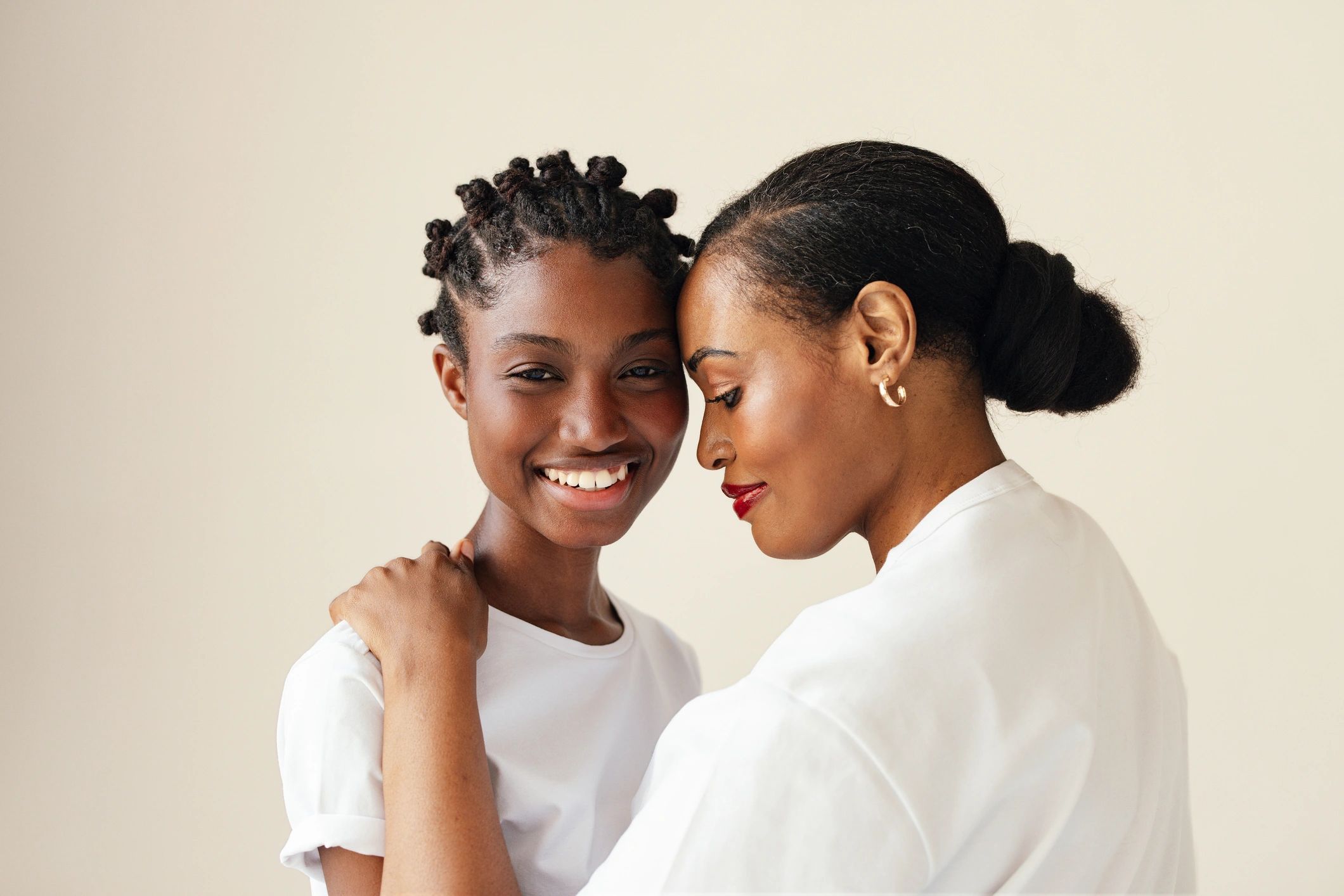 Warm portrait of two people smiling