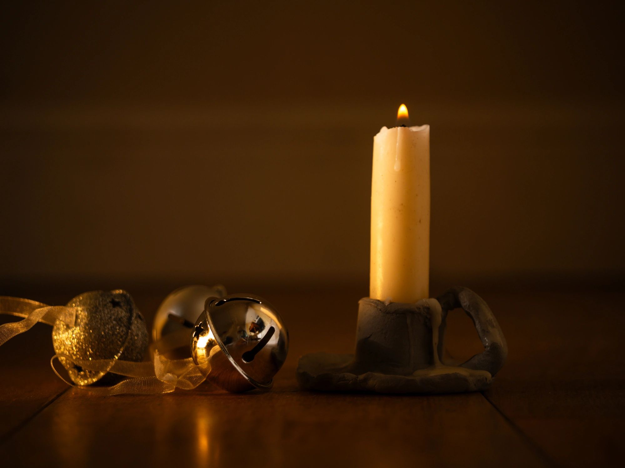 Warm candlelit sanctuary interior with soft bokeh lights